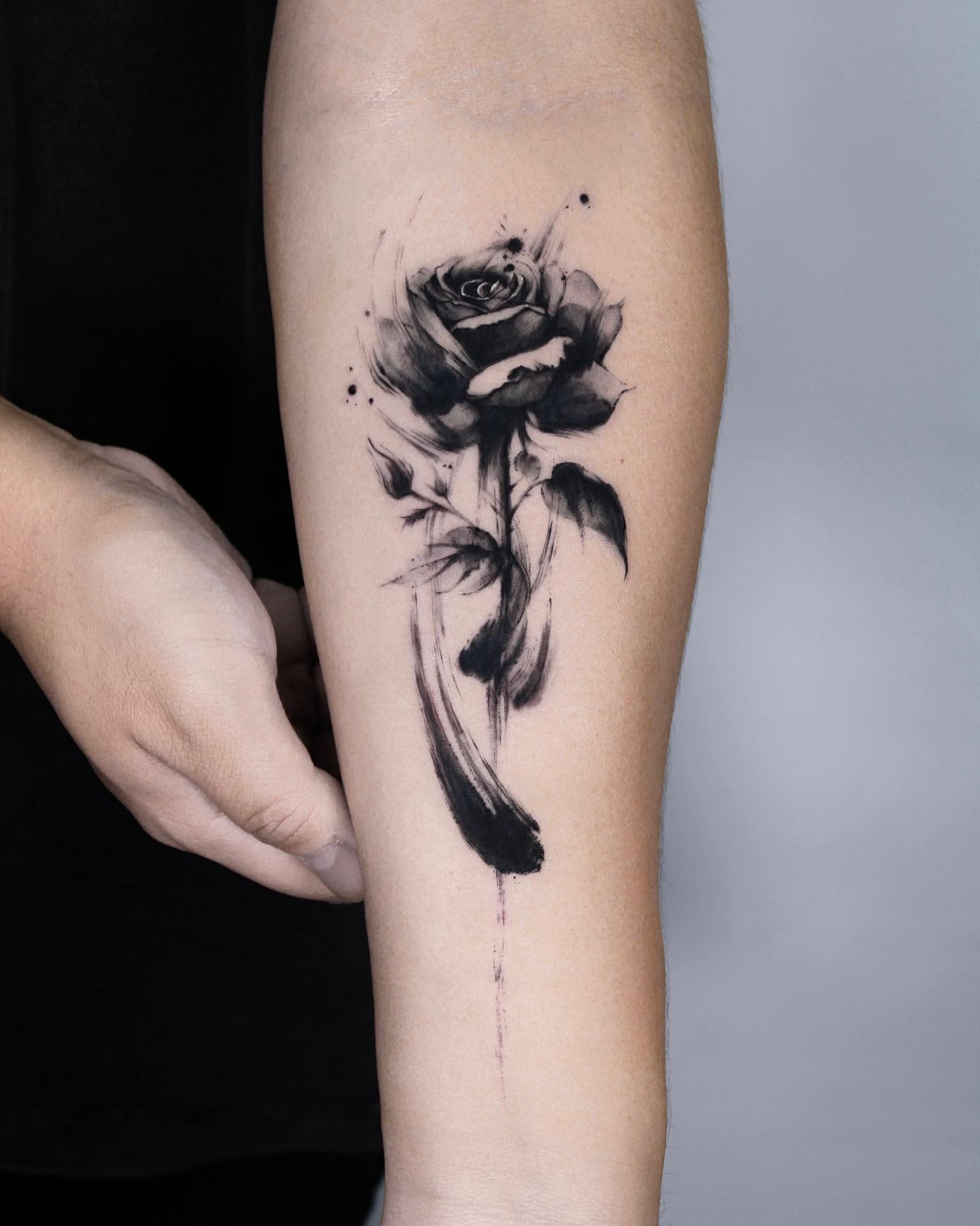 Black Rose Tattoo on Arm