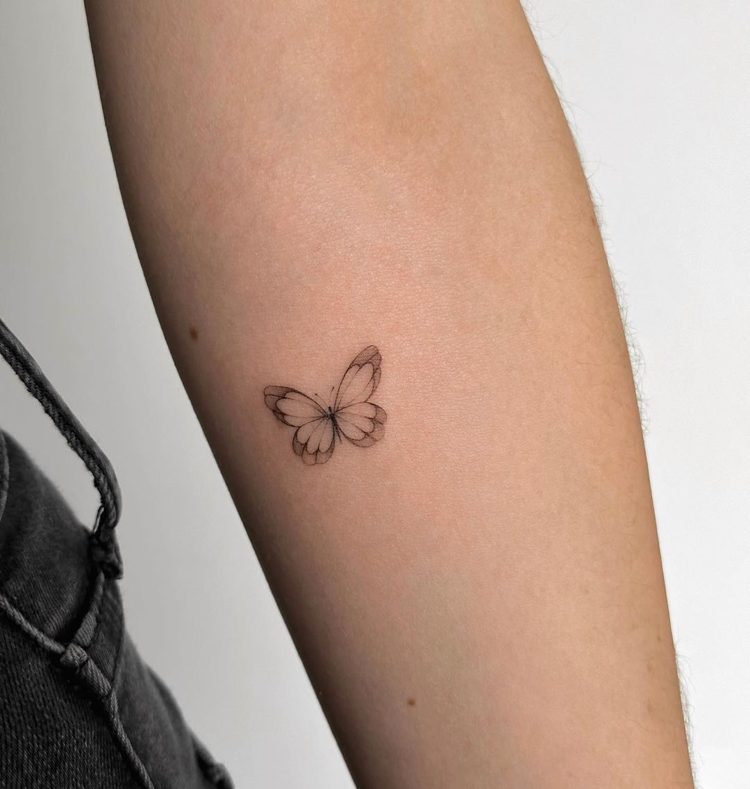 Small Butterfly Tattoo on Arm