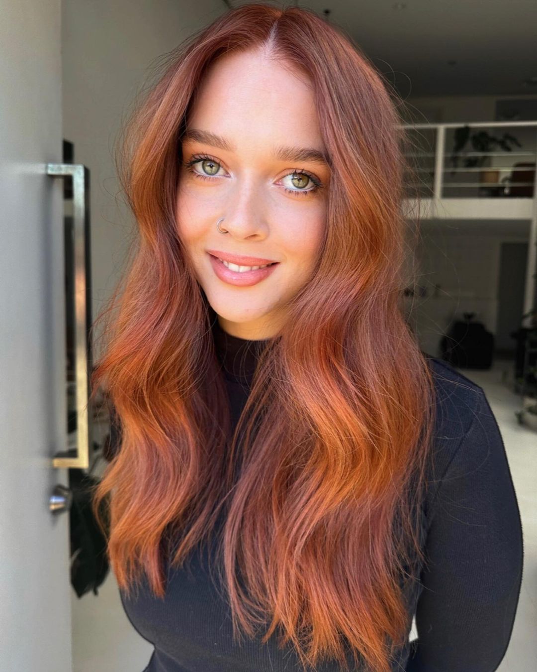 Long Wavy Auburn Brown Hairstyle