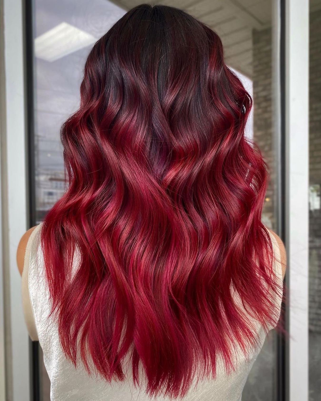 Metallic Red Ombre on Long Wavy Hair