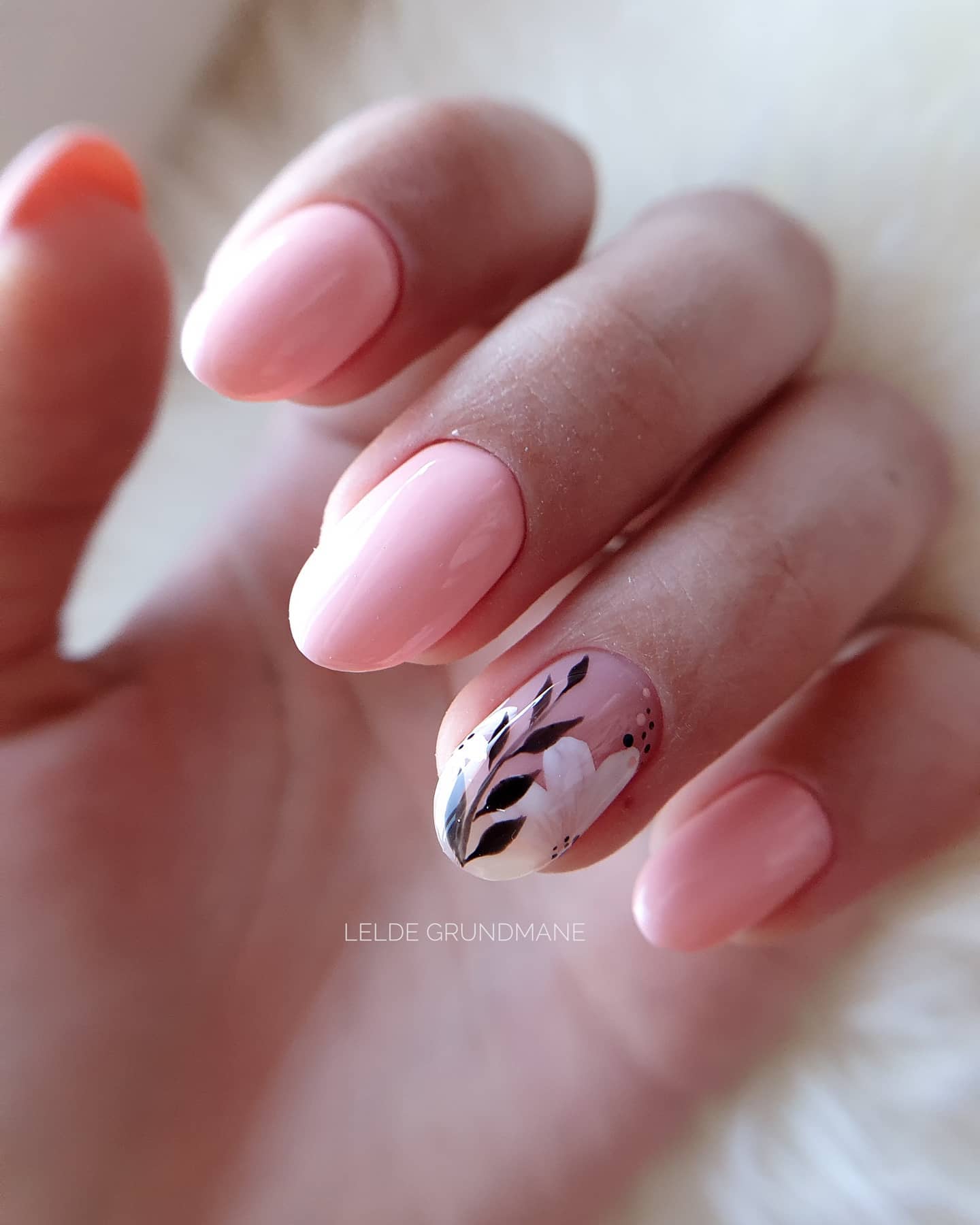 Short Pink Nails with Floral Design