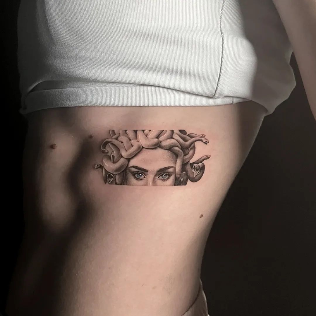 Small Medusa Tattoo on Left Side