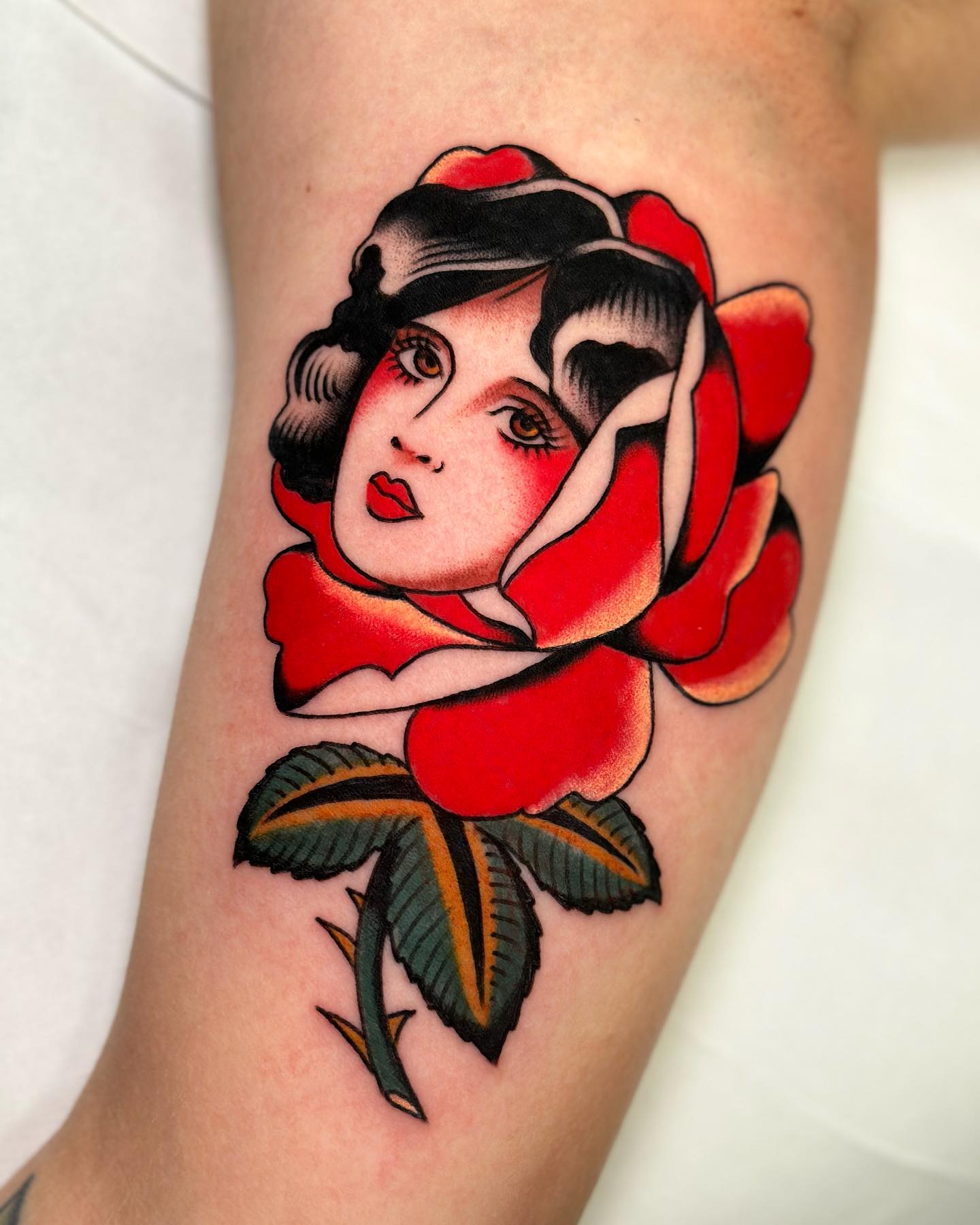 Lady in Rose Tattoo on Arm