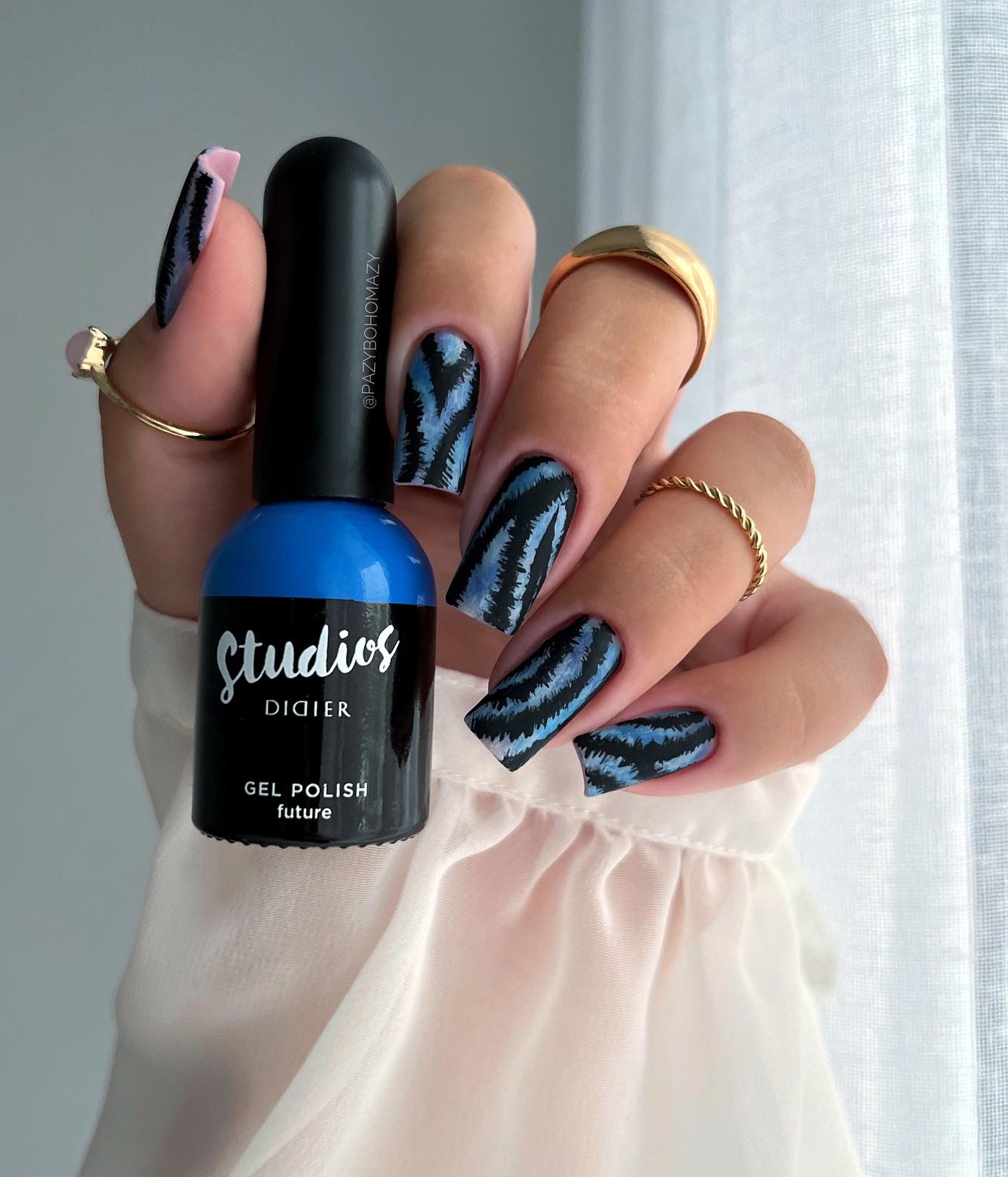 Blue and Black Nail Design