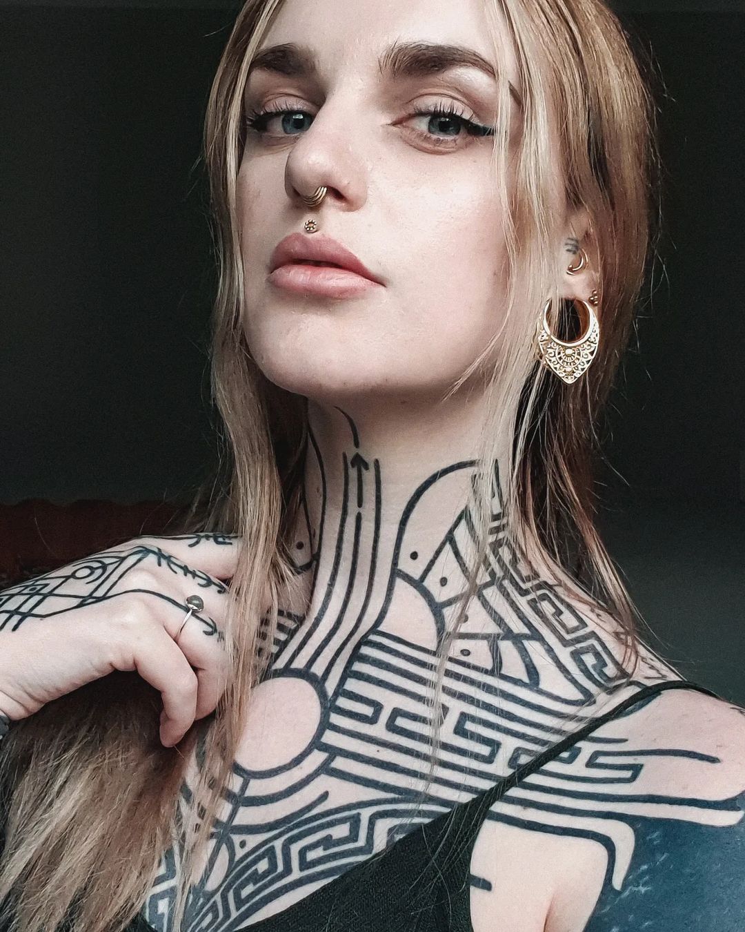 Full Neck and Chest Abstract Tattoo for Women