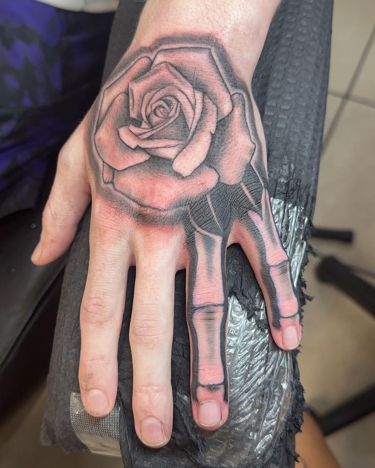 Rose and Skeleton Tattoo on Hand