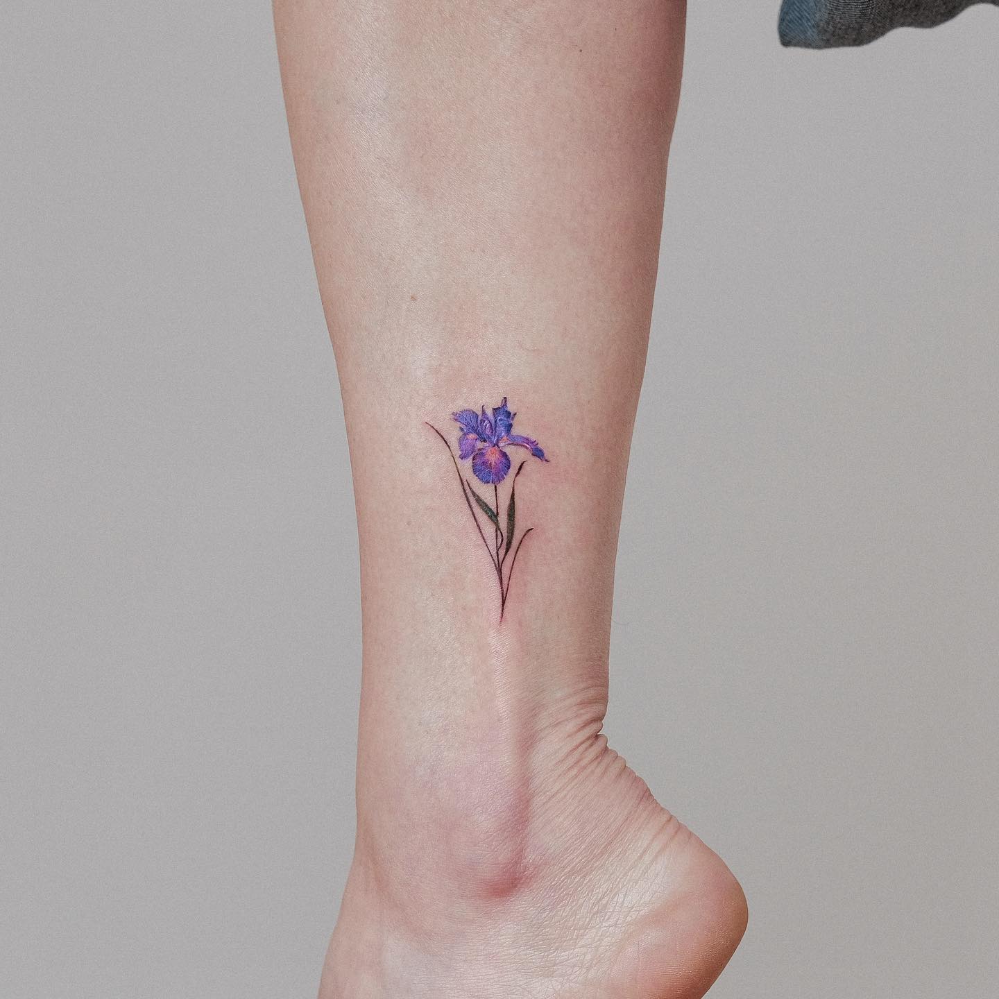 Blue Iris Flower Tattoo on Ankle