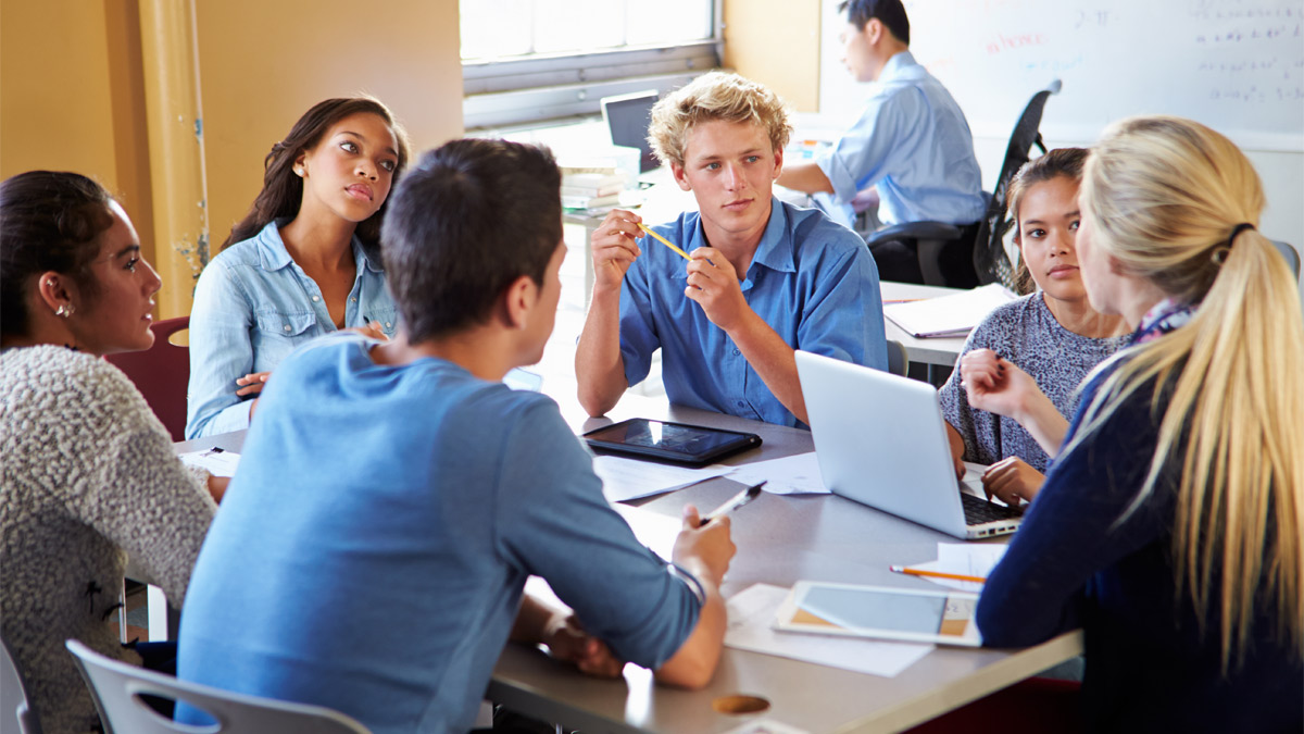 students in classroom with teacher