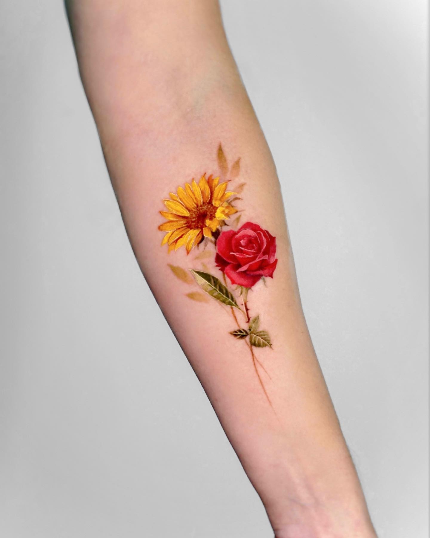 Rose and Sunflower Tattoo on Arm