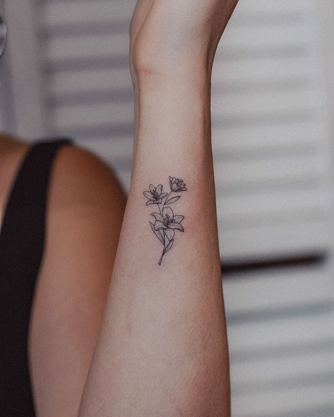 Black and White Lily Flower Tattoo on Wrist