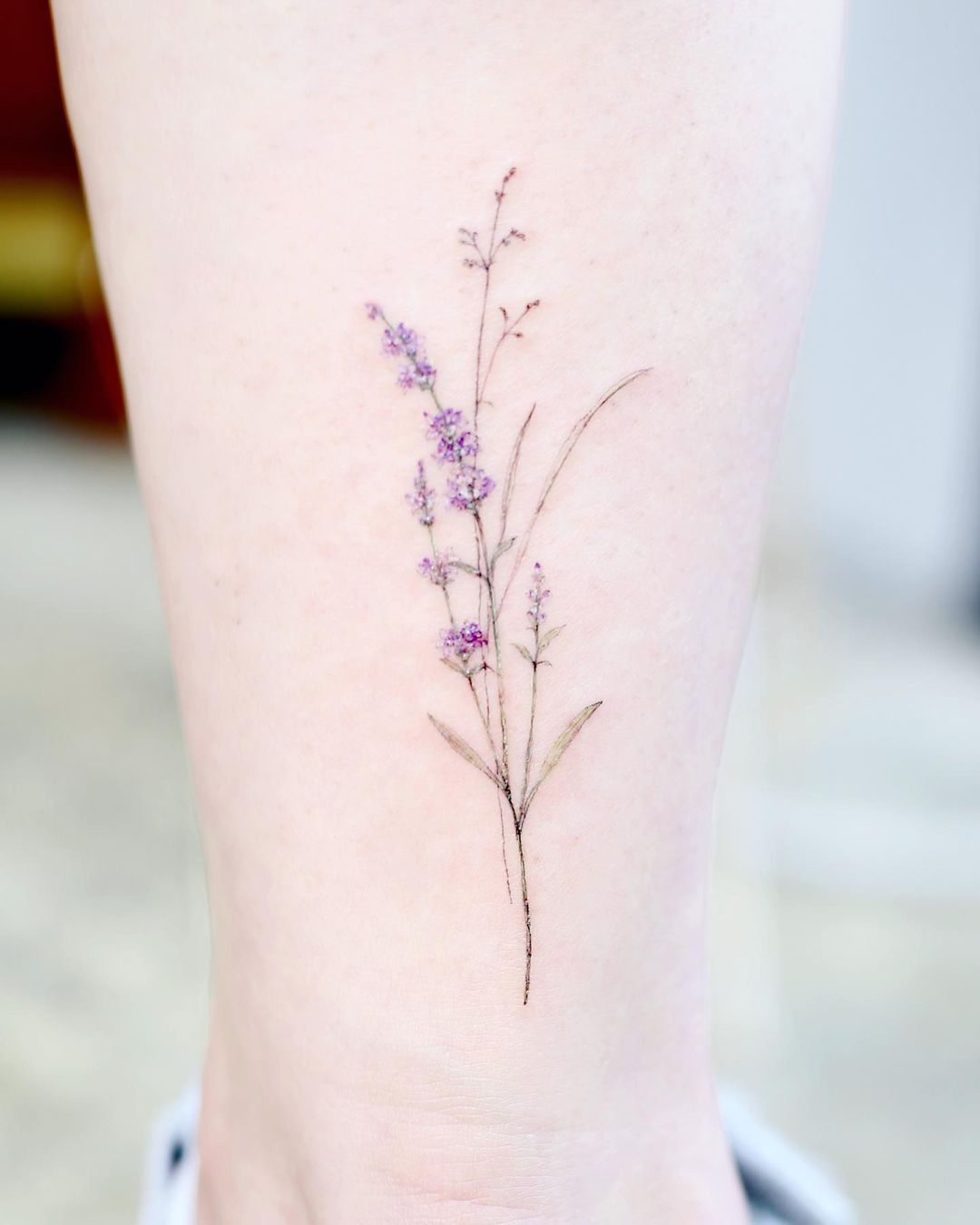 Tiny Lavender Tattoo on Leg