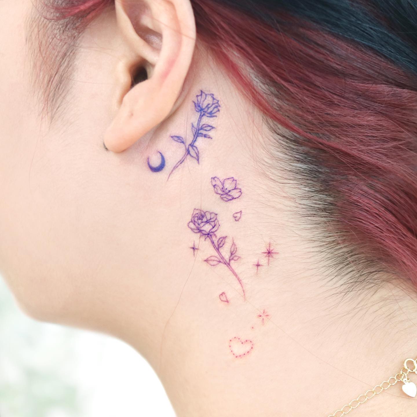 Blue Mini Rose Tattoo Behind Ear