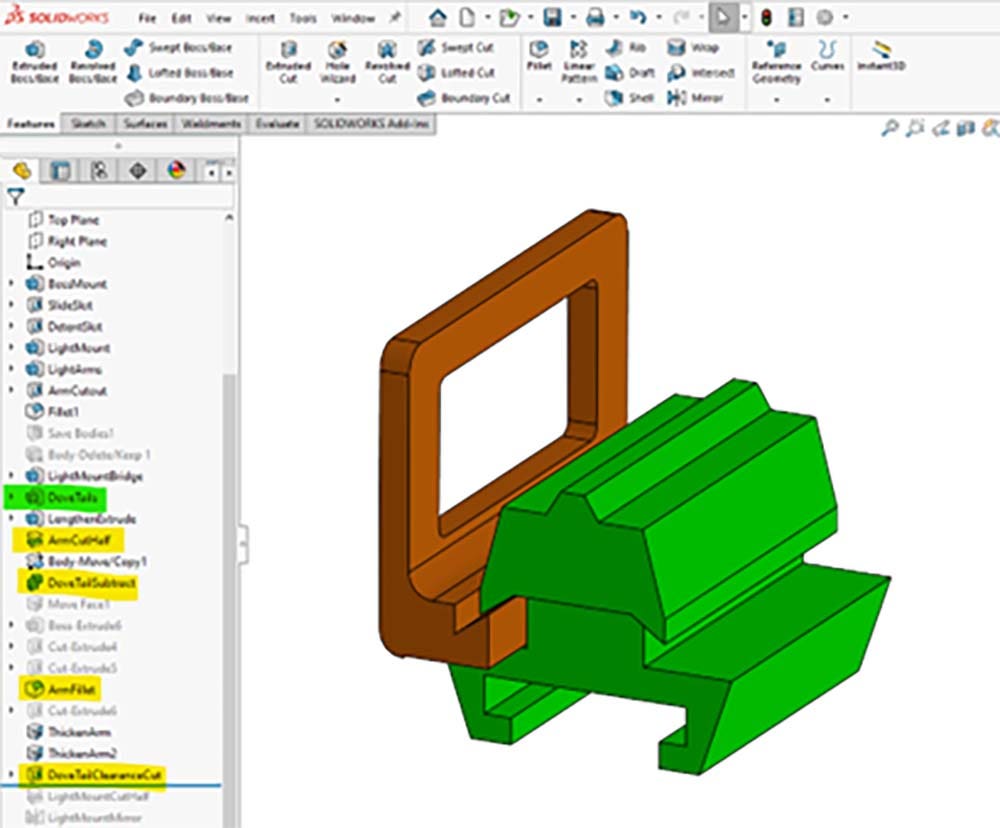 A 3D model of the bike light mount with smaller dovetails and arm in SOLIDWORKS